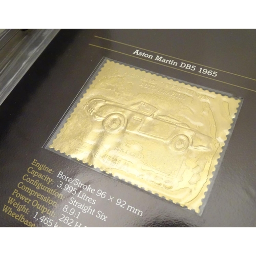1006 - An album of 22ct gold Zambian stamps, each depicting a classic car and mounted on a card with detail... 