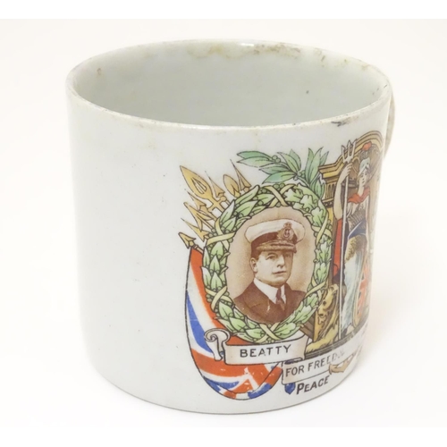 1015 - Militaria: an early 20thC ceramic mug with First World War / WWI / World War 1 commemorative decorat... 