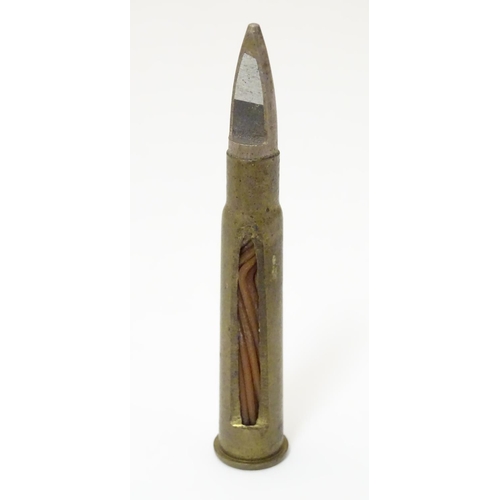 1017 - Militaria: a WWI / First World War / World War 1 inert cut-away .303 display bullet, together with a... 