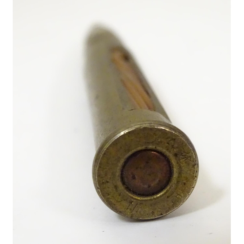 1017 - Militaria: a WWI / First World War / World War 1 inert cut-away .303 display bullet, together with a... 