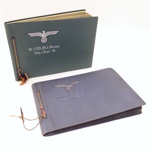 1020 - Militaria: Two German WWII / World War 2 / Second World War photograph albums, comprising: 
Geschwad... 