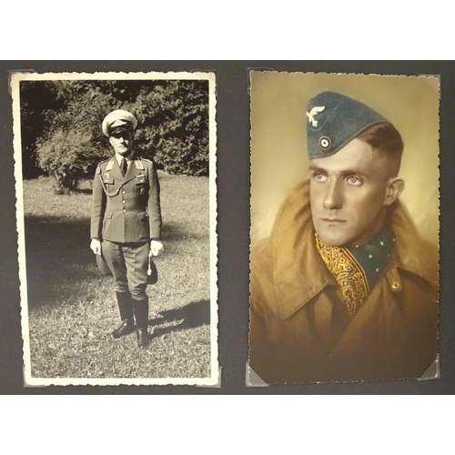 1020 - Militaria: Two German WWII / World War 2 / Second World War photograph albums, comprising: 
Geschwad... 