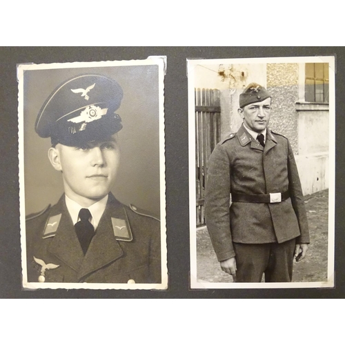 1020 - Militaria: Two German WWII / World War 2 / Second World War photograph albums, comprising: 
Geschwad... 