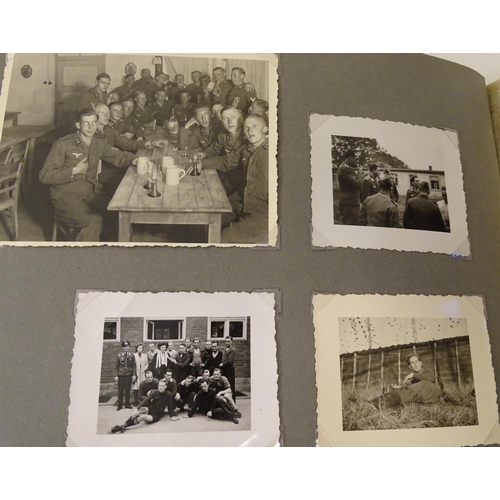 1020 - Militaria: Two German WWII / World War 2 / Second World War photograph albums, comprising: 
Geschwad... 