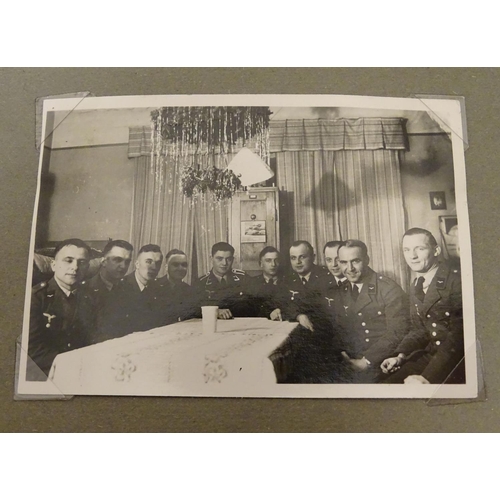 1020 - Militaria: Two German WWII / World War 2 / Second World War photograph albums, comprising: 
Geschwad... 