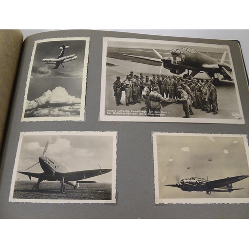 1020 - Militaria: Two German WWII / World War 2 / Second World War photograph albums, comprising: 
Geschwad... 