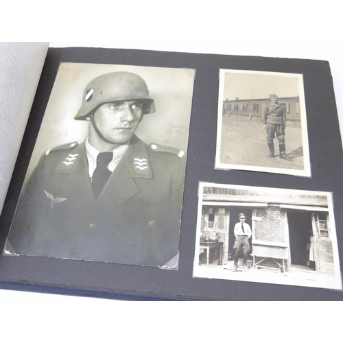 1020 - Militaria: Two German WWII / World War 2 / Second World War photograph albums, comprising: 
Geschwad... 