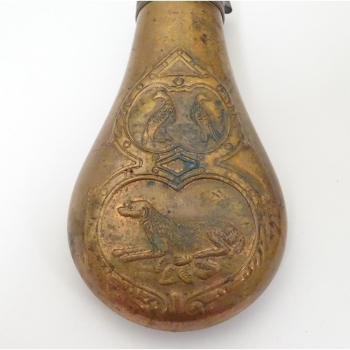 1028 - A 19thC copper and brass powder flask, decorated with gundog and gamebird motifs on both sides, 6 3/... 