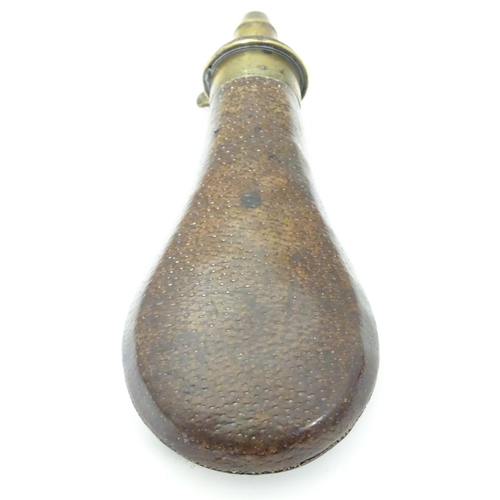 1030 - A 19thC Sykes Patent powder flask, of brass and leather construction with provision for 3, 3 1/4 or ... 