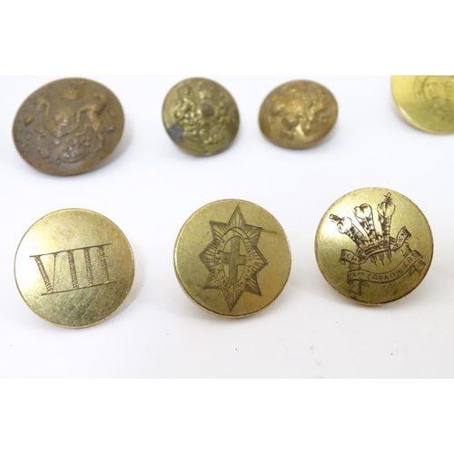 1035 - Militaria: a collection of 19thC and later brass tunic buttons, regimental and civil designations, c... 