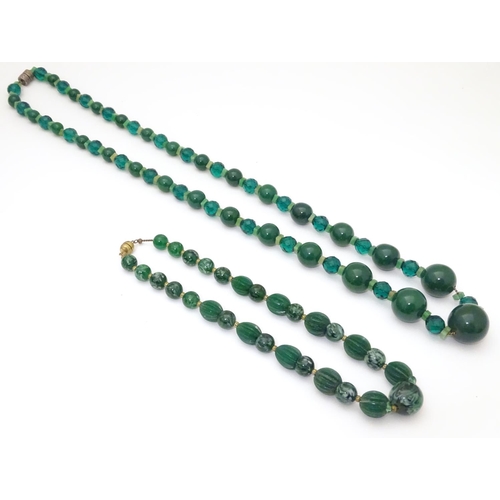 944 - Two vintage bead necklaces, both with various green beads. The longest approx 32