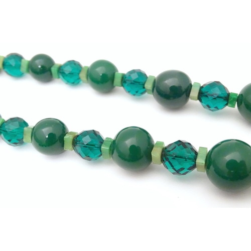 944 - Two vintage bead necklaces, both with various green beads. The longest approx 32