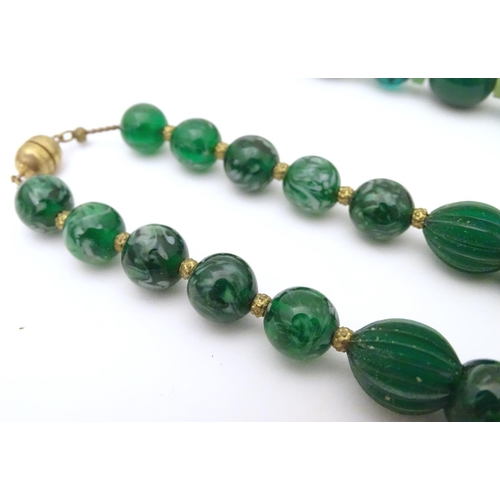 944 - Two vintage bead necklaces, both with various green beads. The longest approx 32