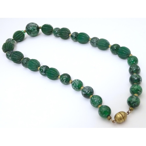 944 - Two vintage bead necklaces, both with various green beads. The longest approx 32