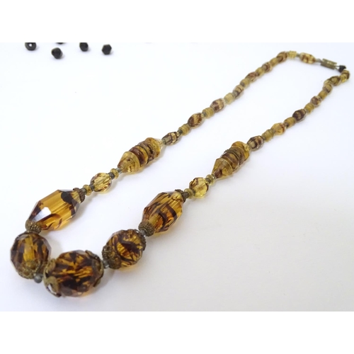 946 - A quantity of assorted vintage bead necklaces and beads the longest approx. 26