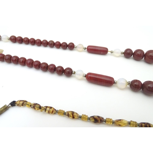 946 - A quantity of assorted vintage bead necklaces and beads the longest approx. 26