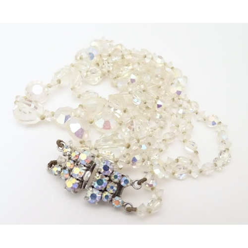 949 - A quantity of assorted vintage bead necklaces , various examples.