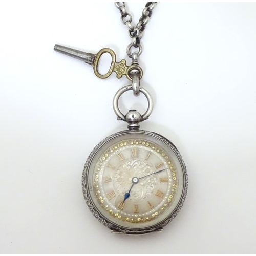 952 - A Continental silver cased pocket / fob watch the movement marked W & Co, Swiss made. Together with ... 