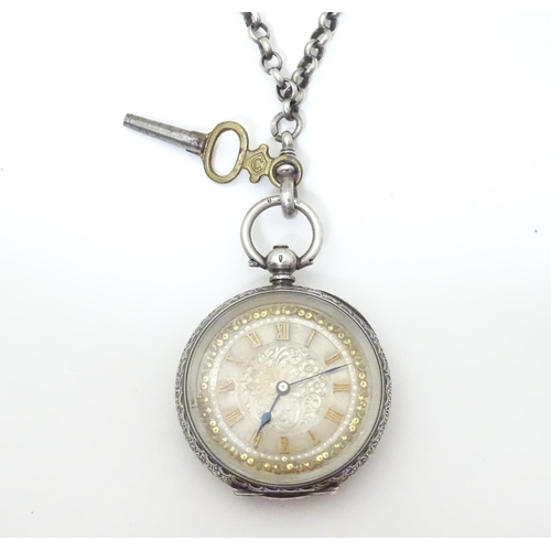 952 - A Continental silver cased pocket / fob watch the movement marked W & Co, Swiss made. Together with ... 