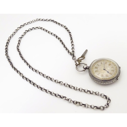 952 - A Continental silver cased pocket / fob watch the movement marked W & Co, Swiss made. Together with ... 