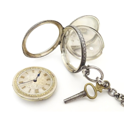 952 - A Continental silver cased pocket / fob watch the movement marked W & Co, Swiss made. Together with ... 