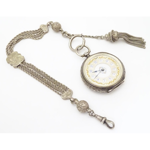 953 - A Victorian silver pocket watch with enamel dial with gilt and blue detail, hallmarked Birmingham 18... 