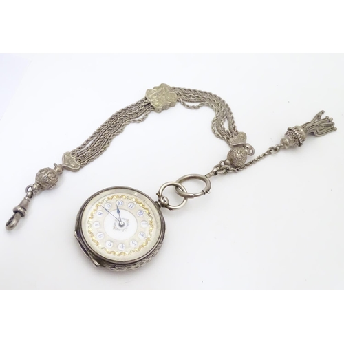 953 - A Victorian silver pocket watch with enamel dial with gilt and blue detail, hallmarked Birmingham 18... 