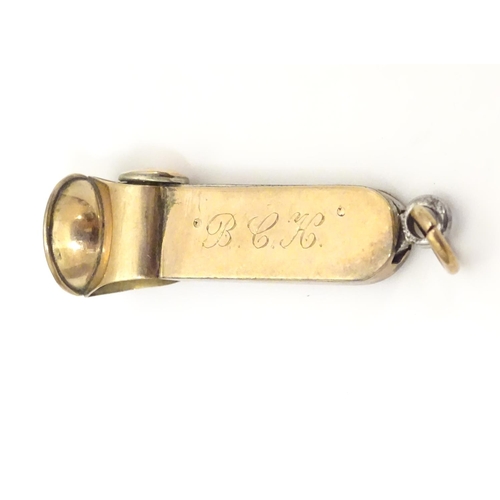 955A - A 9ct gold cheroot cutter, hallmarked Chester 1908, maker S. Blanckensee & Sons Ltd. Approx. 1 3/4