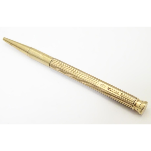 957 - A 9ct gold Baker's Perm-Point pencil Hallmarked Birmingham 1957. Approx 3 3/4