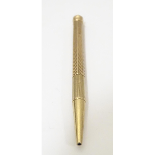 957 - A 9ct gold Baker's Perm-Point pencil Hallmarked Birmingham 1957. Approx 3 3/4