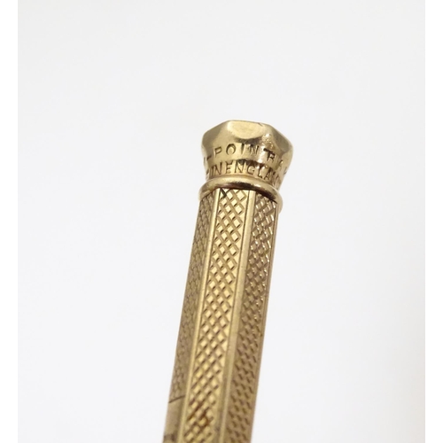 957 - A 9ct gold Baker's Perm-Point pencil Hallmarked Birmingham 1957. Approx 3 3/4