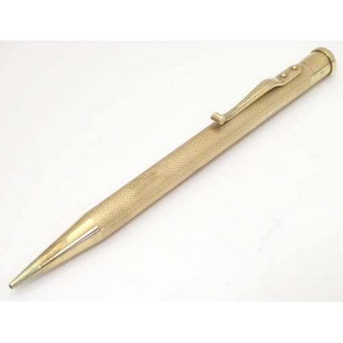 958 - A 9ct gold  Yard - O - Led pencil with engine turned decoration. marked Patent 422767 and hallmarked... 