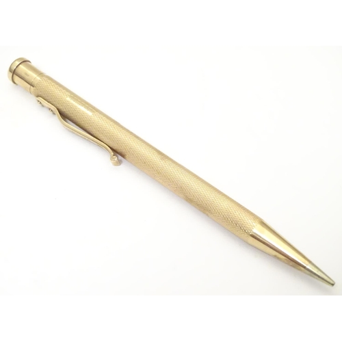 958 - A 9ct gold  Yard - O - Led pencil with engine turned decoration. marked Patent 422767 and hallmarked... 