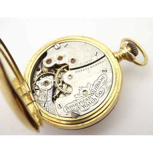 964 - A Waltham pocket / fob watch, the movement signed The American Waltham Watch Co., 18ct gold case sta... 