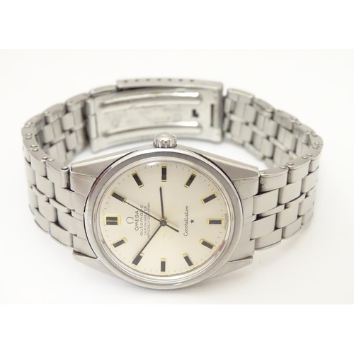 973 - A mid 20thC Omega Constellation automatic chronometer wrist watch, with stainless steel Omega strap,... 