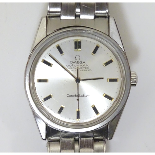 973 - A mid 20thC Omega Constellation automatic chronometer wrist watch, with stainless steel Omega strap,... 