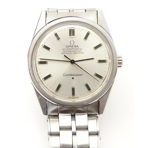 973 - A mid 20thC Omega Constellation automatic chronometer wrist watch, with stainless steel Omega strap,... 