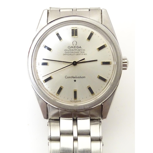 973 - A mid 20thC Omega Constellation automatic chronometer wrist watch, with stainless steel Omega strap,... 