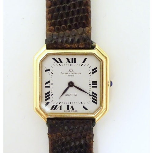 975 - A Baume & Mercier wrist watch, the 18ct gold case of squared canted form with 7/8