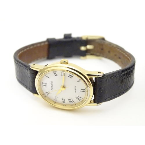 975A - Three various ladies wrist watches to include one with 9ct gold case, the dial signed Limit. Togethe... 