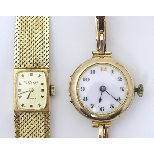 978A - A ladies 9ct gold wrist watch with enamel dial, the case stamped D&R 20152, dial approx. 3/4