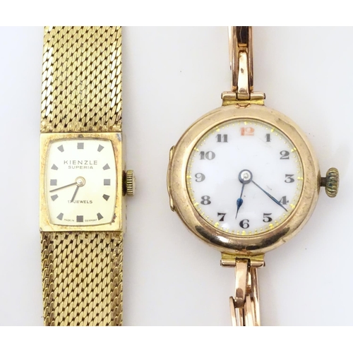 978A - A ladies 9ct gold wrist watch with enamel dial, the case stamped D&R 20152, dial approx. 3/4