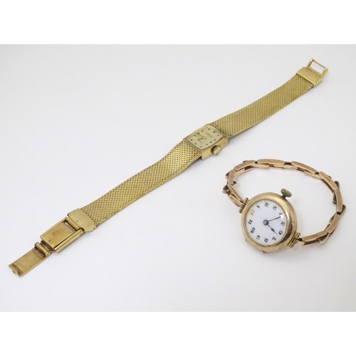 978A - A ladies 9ct gold wrist watch with enamel dial, the case stamped D&R 20152, dial approx. 3/4