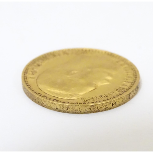 984 - Coin: A gold 1897 fifteen / 15 rouble coin, depicting a portrait of the Emperor Nikolai II. Approx. ... 