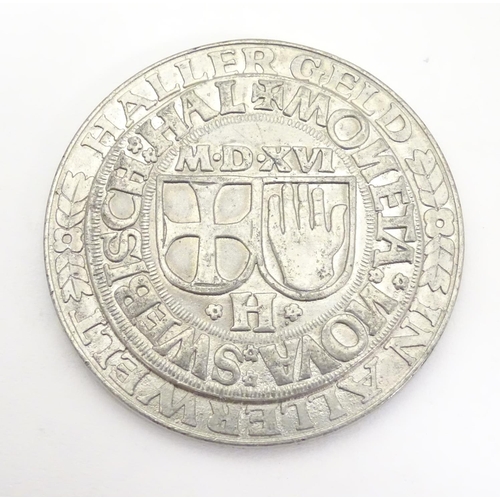 986 - A replica of a Heller coin featuring the imperial eagle and the coat of arms of Schwabisch Hall. App... 