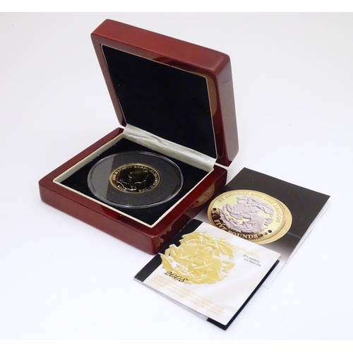 990 - Coin: A Tristan de Cunha 2008 gold and rhodium plated silver piedfort five pounds proof coin with ru... 