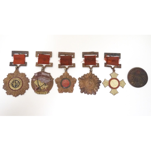 1013 - Militaria: a mid 20thC Chinese PLA medal group, comprising five copper medals and a badge (6)