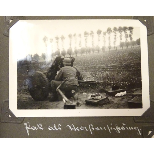 1038 - Militaria: a WWII / World War 2 / Second World War German soldier's photograph album, entitled ' 2. ... 