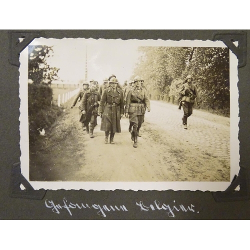 1038 - Militaria: a WWII / World War 2 / Second World War German soldier's photograph album, entitled ' 2. ... 