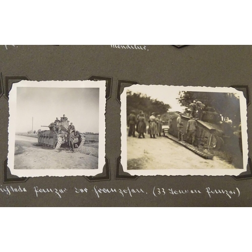 1038 - Militaria: a WWII / World War 2 / Second World War German soldier's photograph album, entitled ' 2. ... 